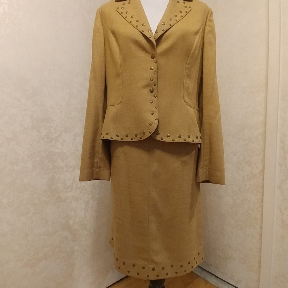 Blazer and skirt set trimmed with metal buttons